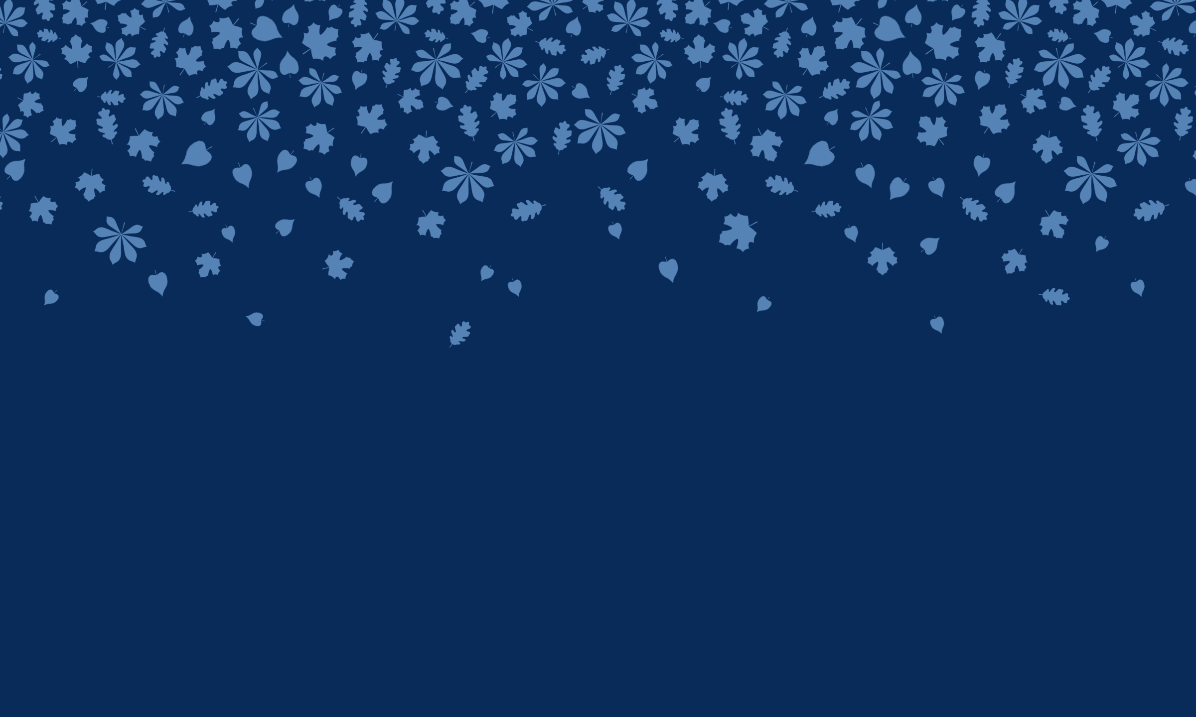 A group of people enjoying a sunny day in a colorful, foliage-filled park, socializing and relaxing under the trees.